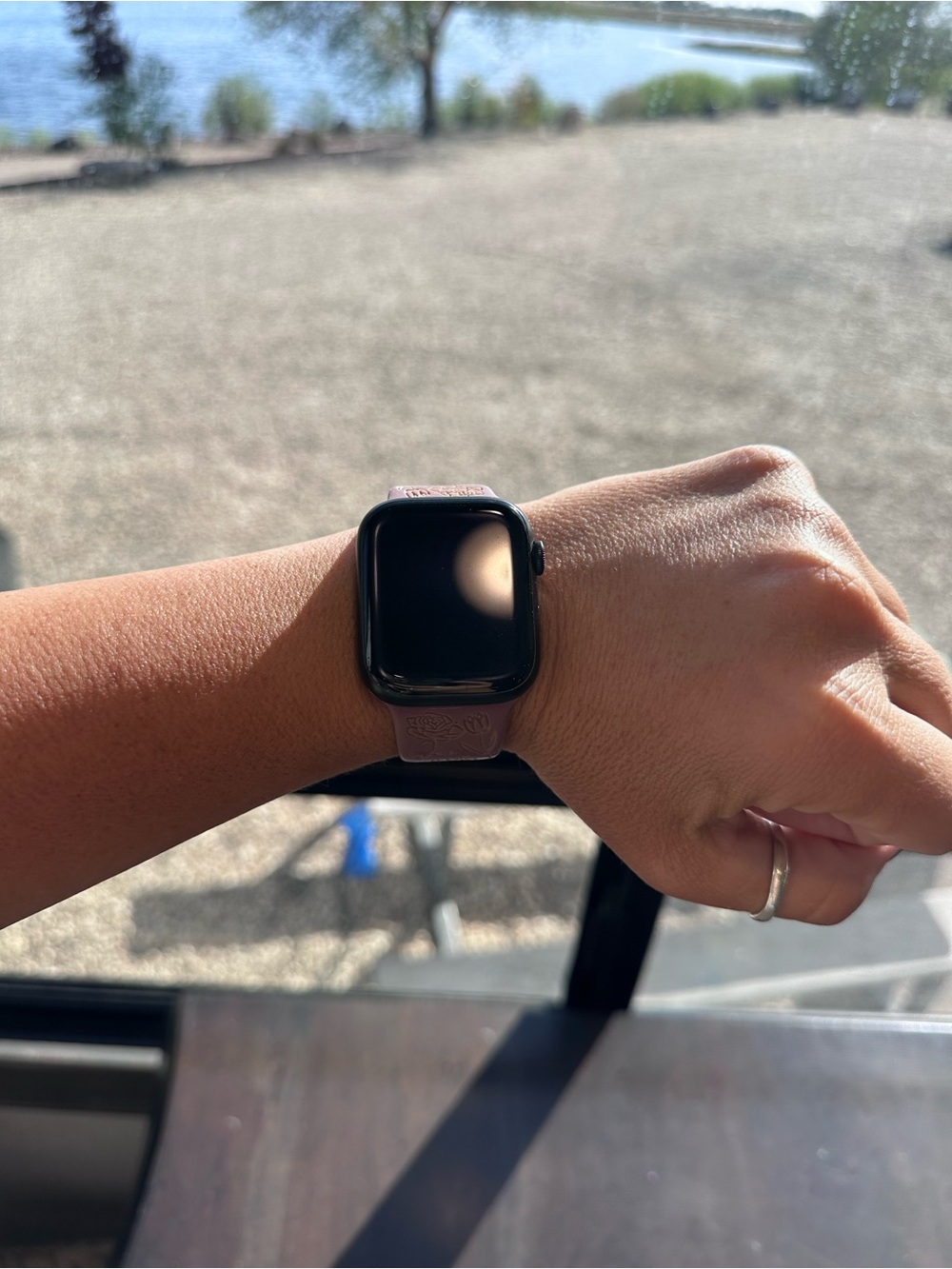 Apple Smartwatch with Black Case and Light Pink Sport Band